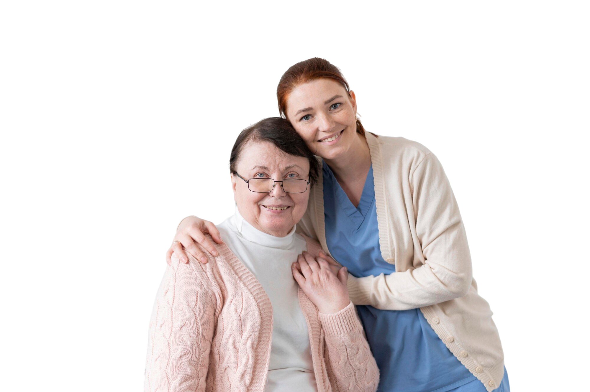 Betreuerin umarmt eine Seniorin